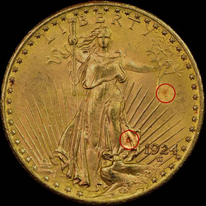 Red spots on real gold bullion